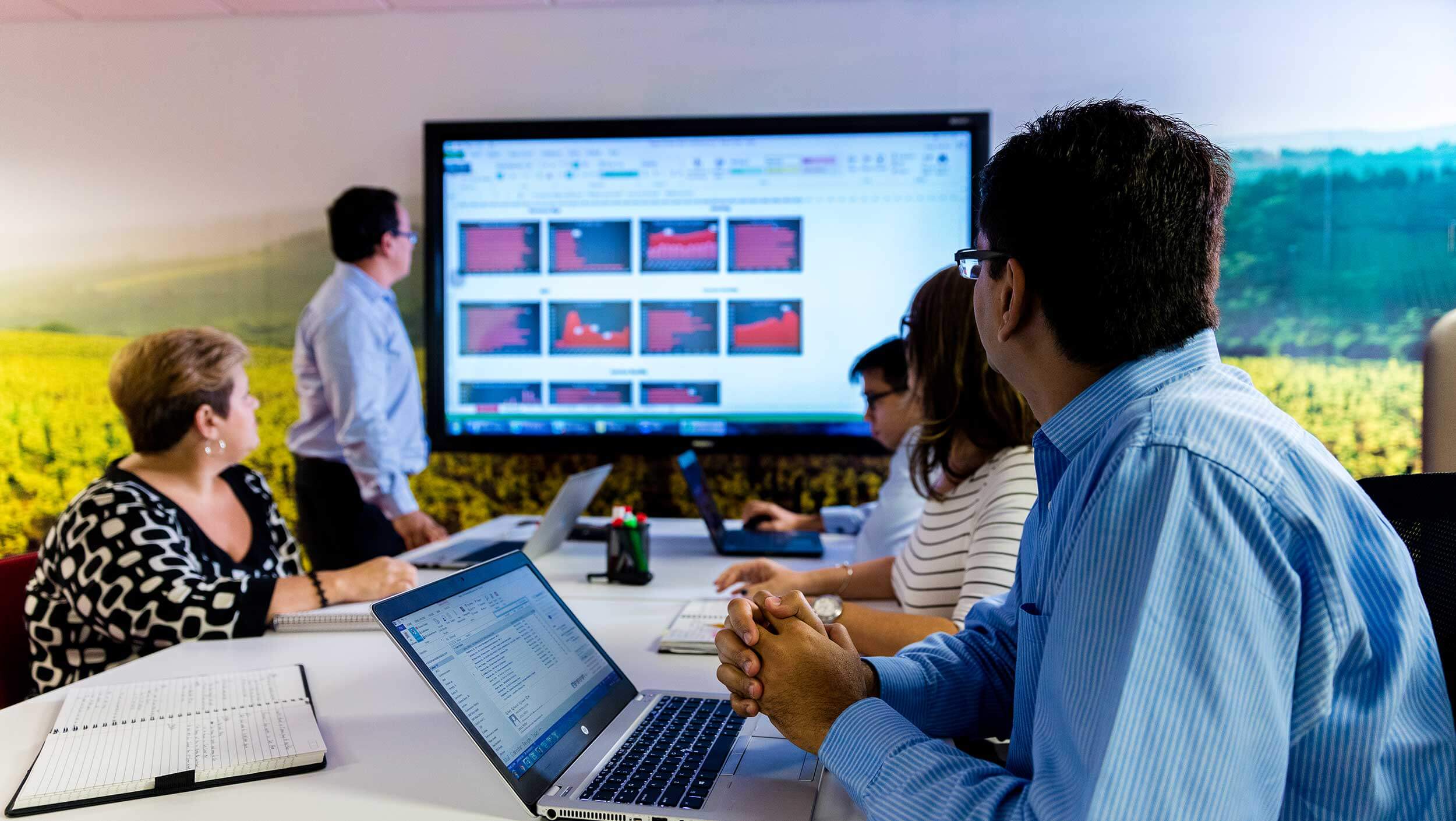 A group of people watching a presentation in Florida